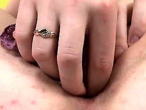 Sultry nympho is gaping slim pussy in close-up and having or